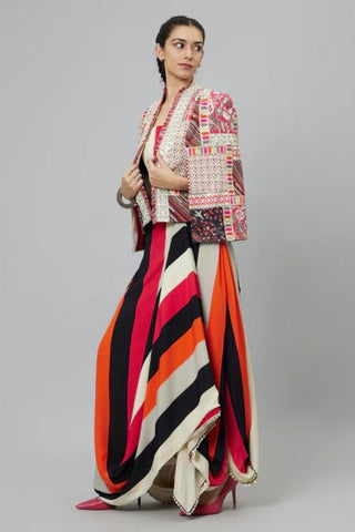 SHAHAR STRIPE PRINT NUSHRAT DRAPED SKIRT AND BUSTIER TEAMED WITH A SIGNATURE STRUCTURED JACKET