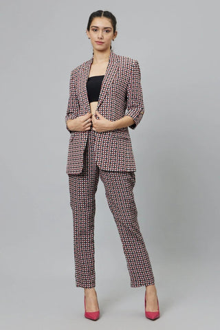 BLACK GEOMETRIC PRINT PANT SUIT PAIRED WITH A BUSTIER