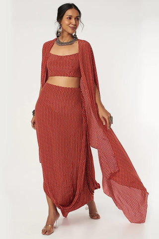 RED LEAF PRINT DRAPE SKIRT WITH ARYA BUSTIER AND CAPE